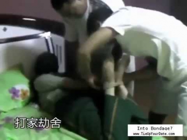 Chinese woman hogtied